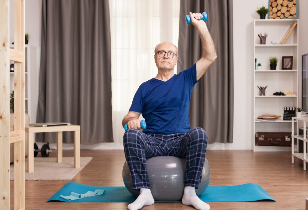grandfather using dumbbells being careful with his health 482257 115